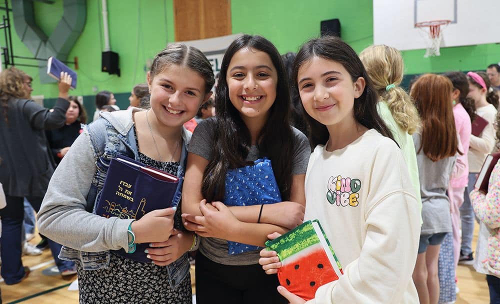 three female middle school students