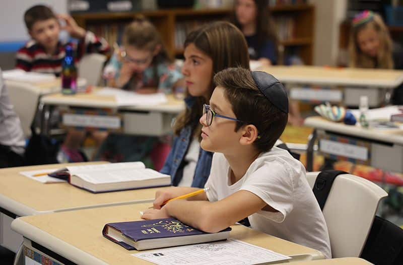 boy at school desk