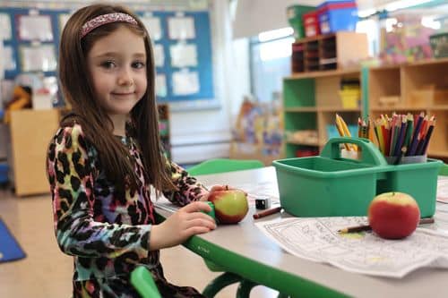 girl eating an apple