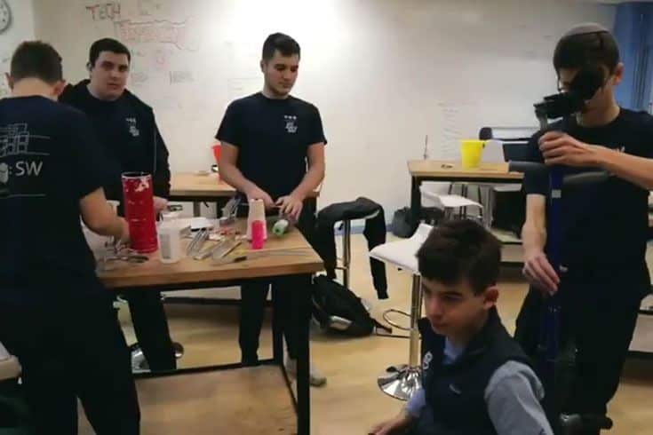 Students working in a physics lab