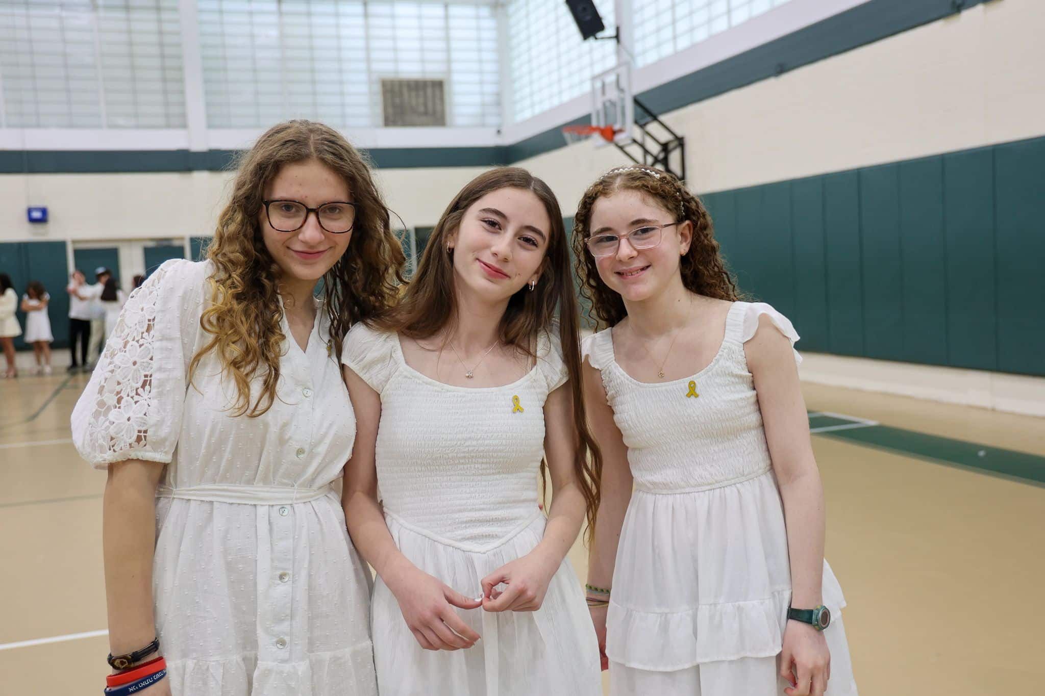 three girls smiling